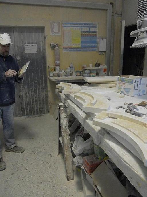 Skilled worker doing manual work on each marble pieces of fountain