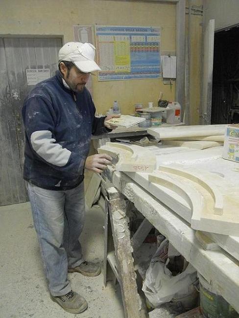 Skilled worker doing manual work on each marble pieces of fountain