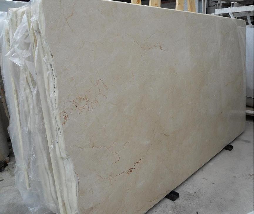 slabs of crema marfil marble, for the fountain