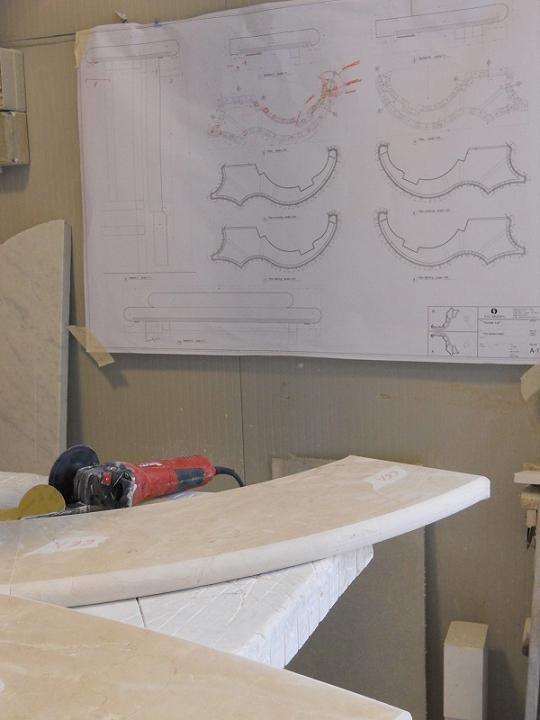 Pieces of crema marfil marble for the fountain according to design