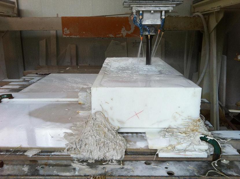 Numerical control machine to making a hole in a block of statuary marble to make a solid sinks