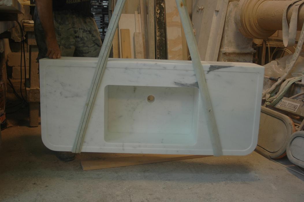 Solid sinks in statuary marble, finished